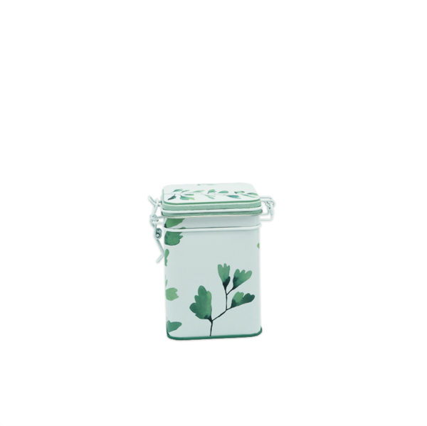 Belle boîte à thé avec un motif de feuilles vertes